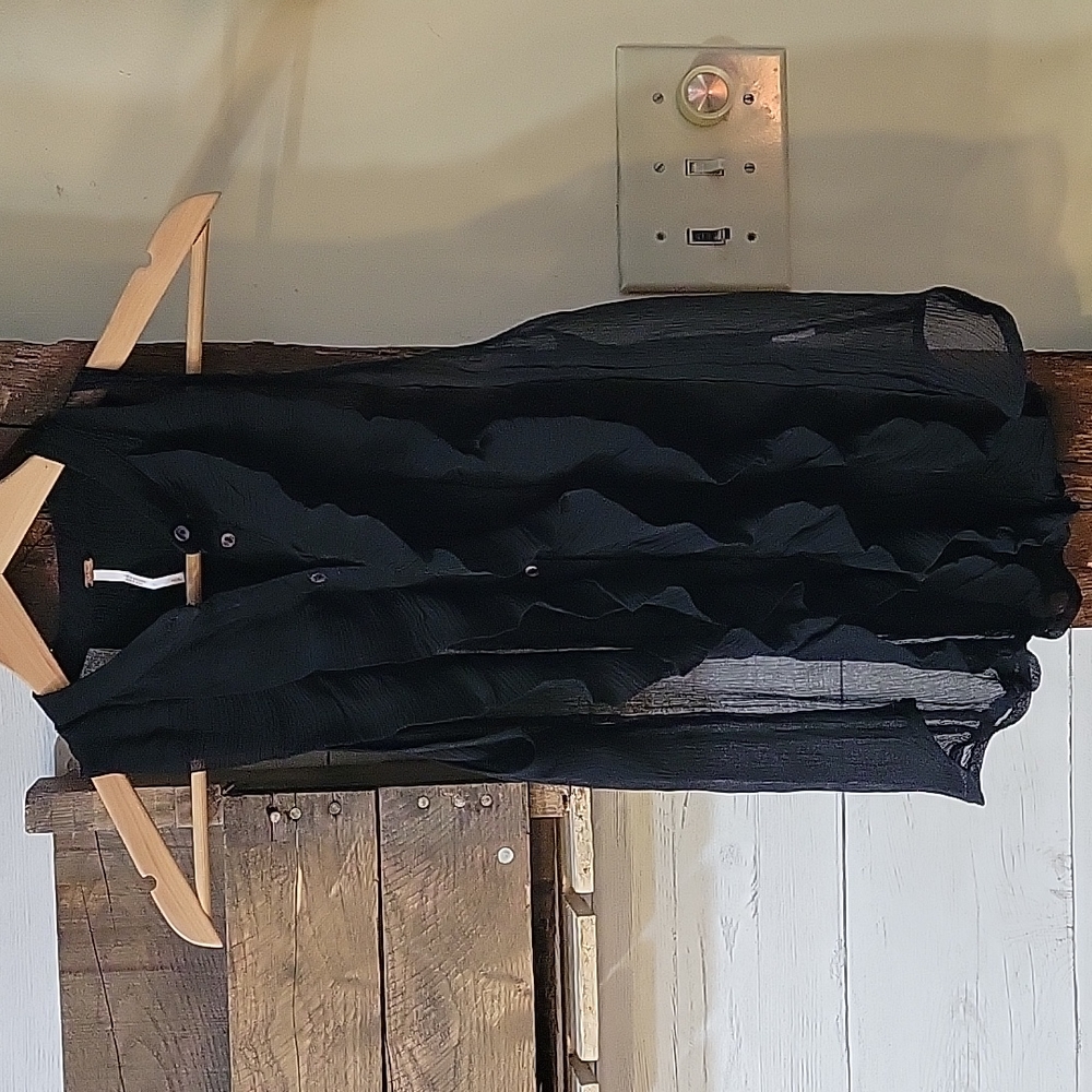 Free People sheer sleeves black top. Size small